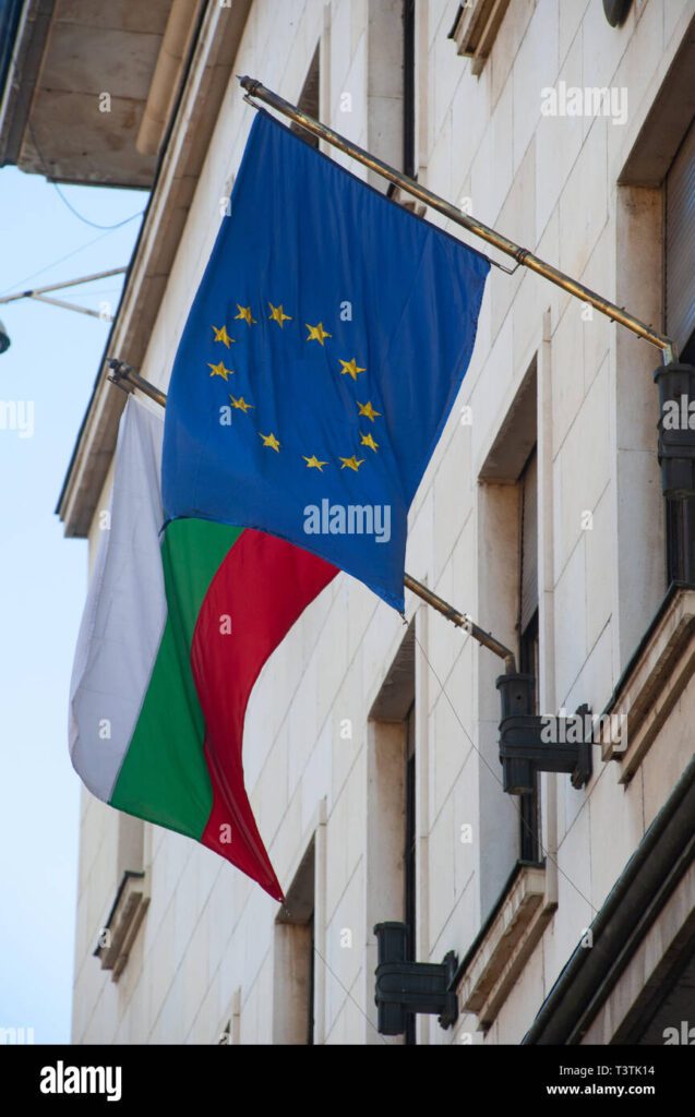 Bulgaria's diplomatic stance, as reflected by its flag alongside the EU flag, is at the heart of the debate over whether to release frozen Russian assets to Ukraine.