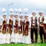 Kazakhstan's cultural heritage is showcased as traditional performers in elaborate attire symbolize the nation's rich traditions, set to be further strengthened by its new trade partnerships with Japan.